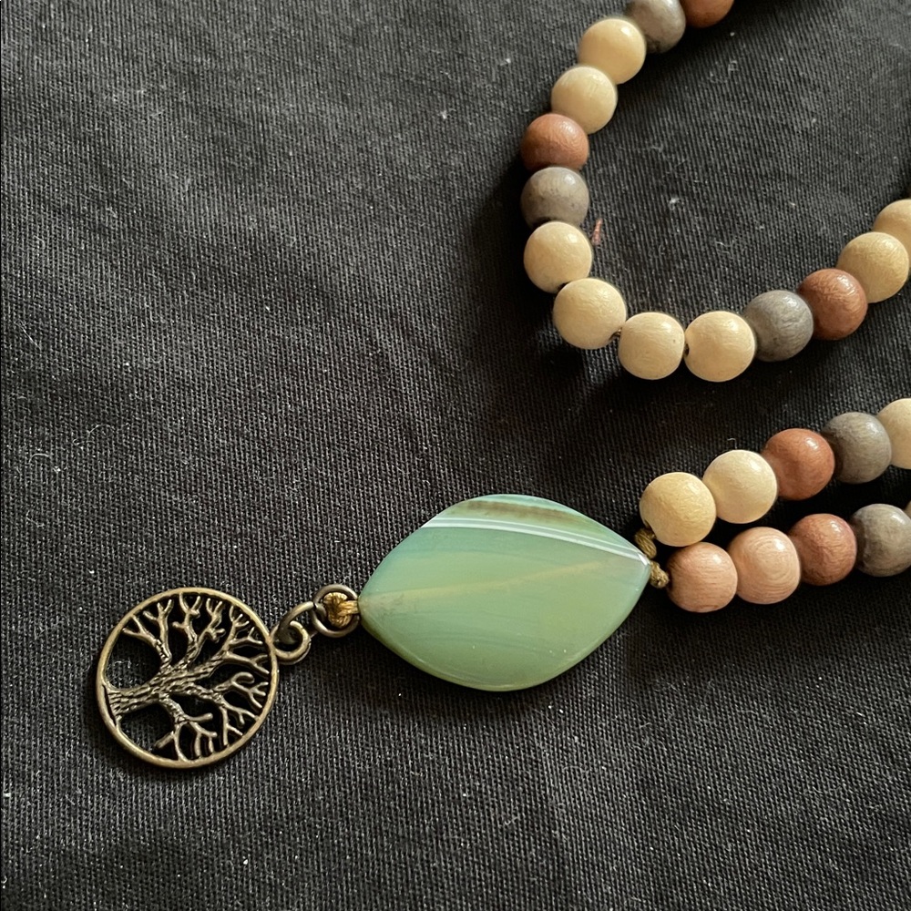 Hand assembled beaded necklace tree of life